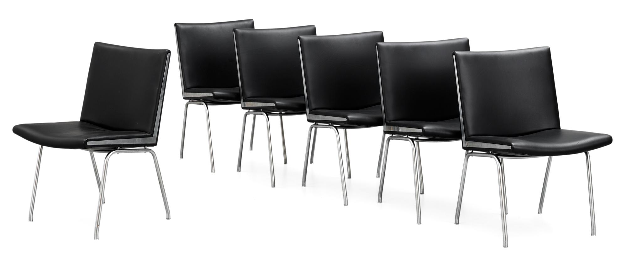 A set of six Hans J Wegner 'Kastrup' steel and black leather chairs, AP-stolen, Denmark.