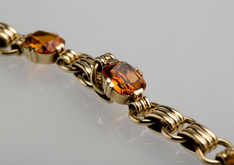 ARMBAND, 14 K guld med citriner, ca 9.00 ct. Vikt ca 16 g.
