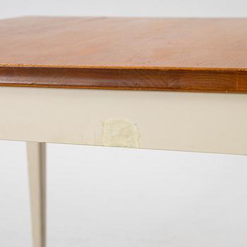 A dining table, mid-20th century.