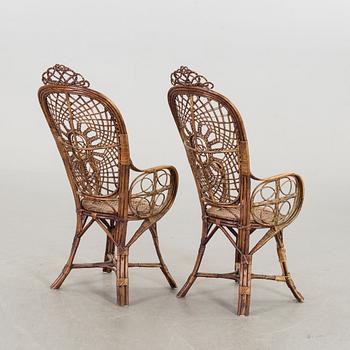 A pair of rattan chairs, early 20th century.