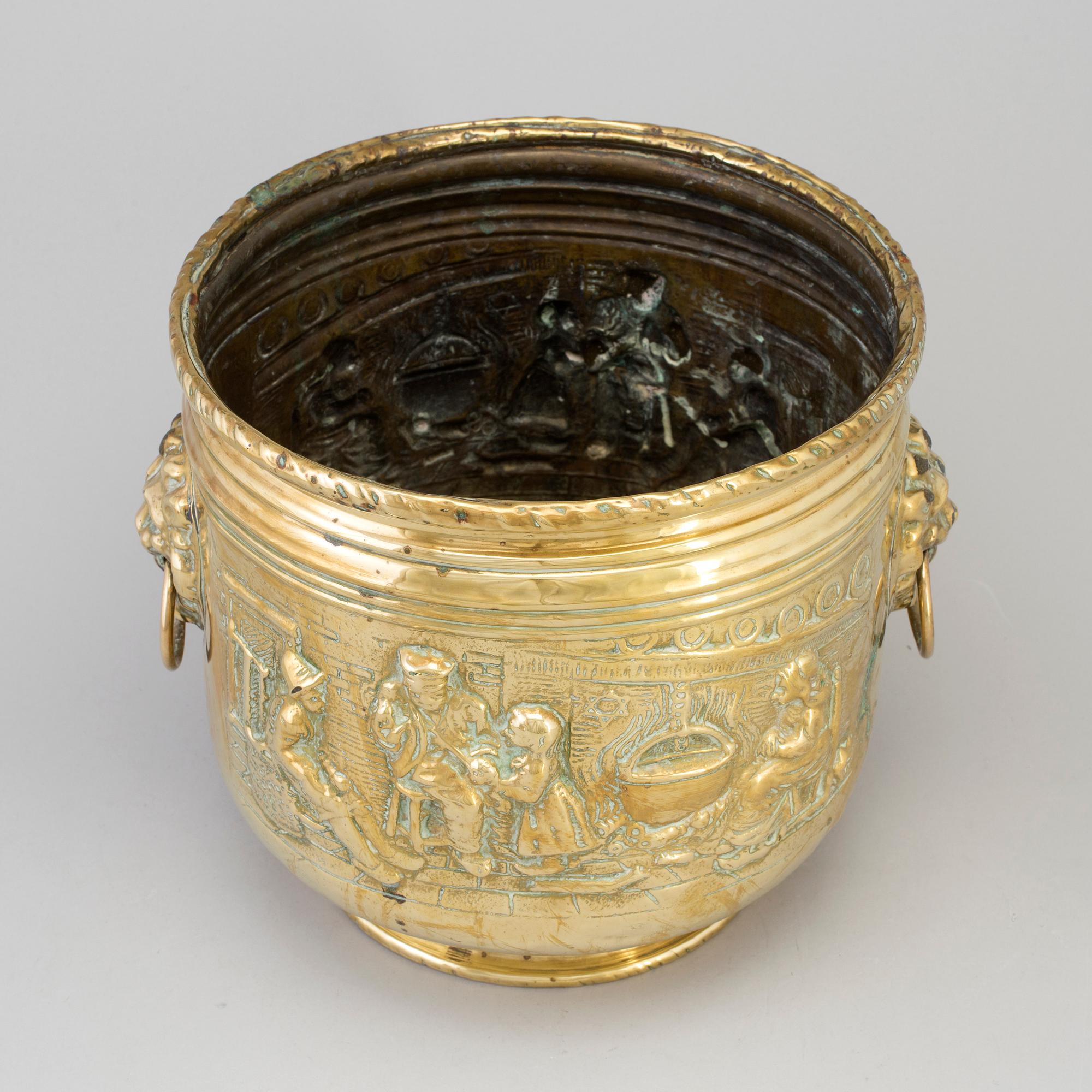 An 18th/19th century brass flower pot.