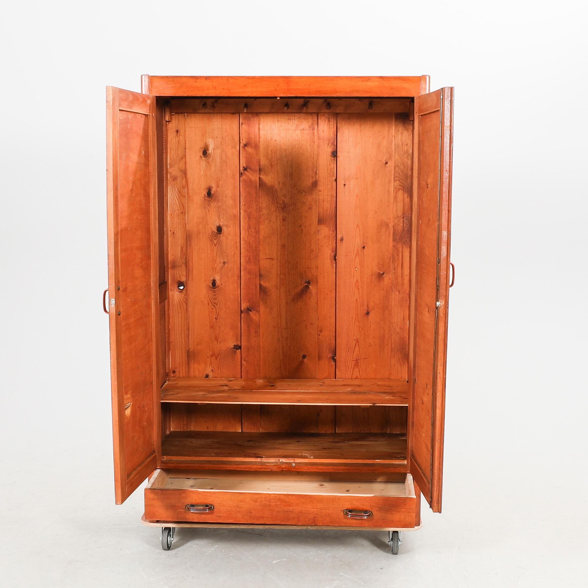 A 1930/40s walnut wardrobe.