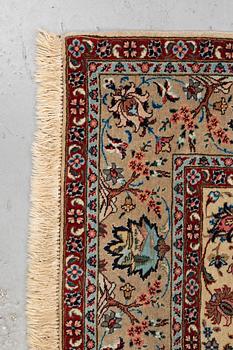 A carpet, semi-antique Tabriz, figural, signed, ca 234 x 170 cm.