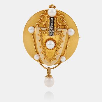 An 18K gold brooch/pendant set with pearls and rose-cut diamonds.