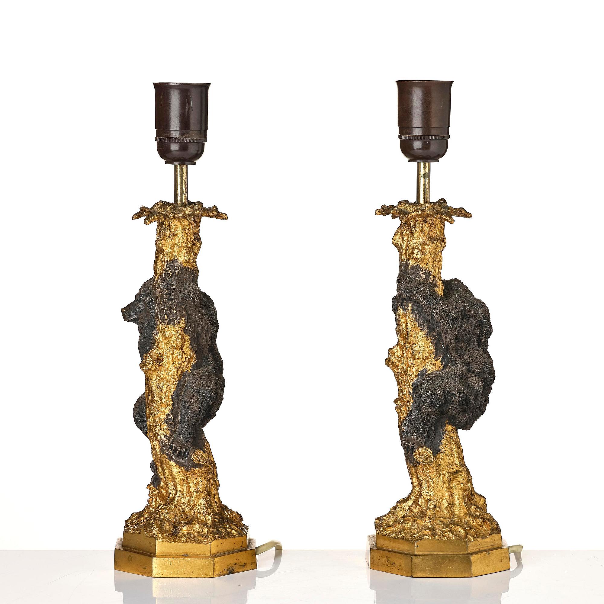A pair of Russian Alexander III gilt and patinated bronze table lamps, late 19th century.