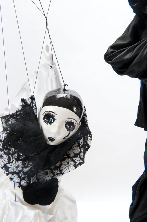 TWO PUPPETS ON A STRING,