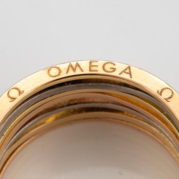 18K gold Omega ring.