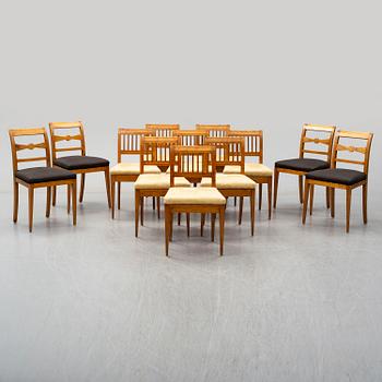 A set of 12 birch chairs (8+4), Biedermeier, mid 19th century.