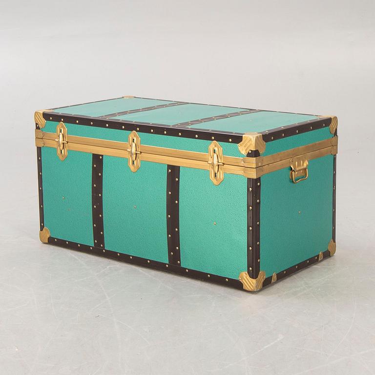 A mid 1900s metal trunk.