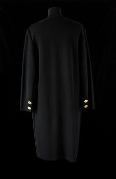 A 1970s black knitted wool coat dress by Yves Saint Laurent.