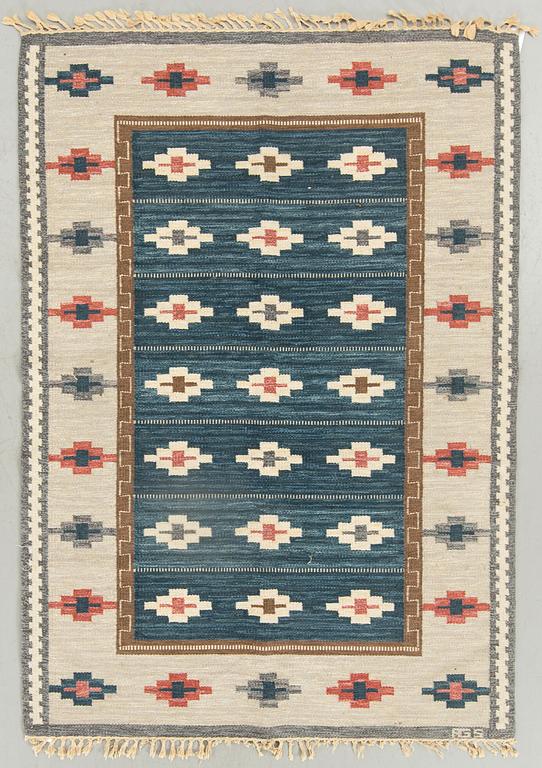 A Swedish signed flatweave carpet ca 242 x 170 cm.