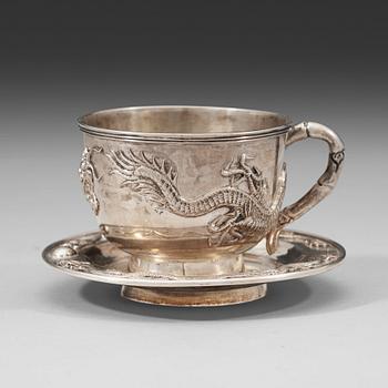 299. An export silver cup and saucer, probably Shanghai, early 20th century.