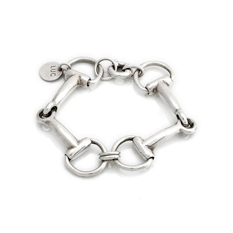 ARMBAND, silver i form av hästbetsel.