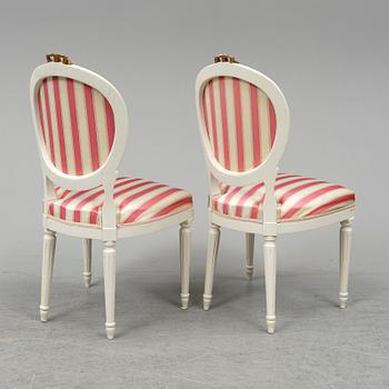 A set of 12 Swedish chairs, gustavian style, for NK (Nordiska Kompaniet), mid 20th century.