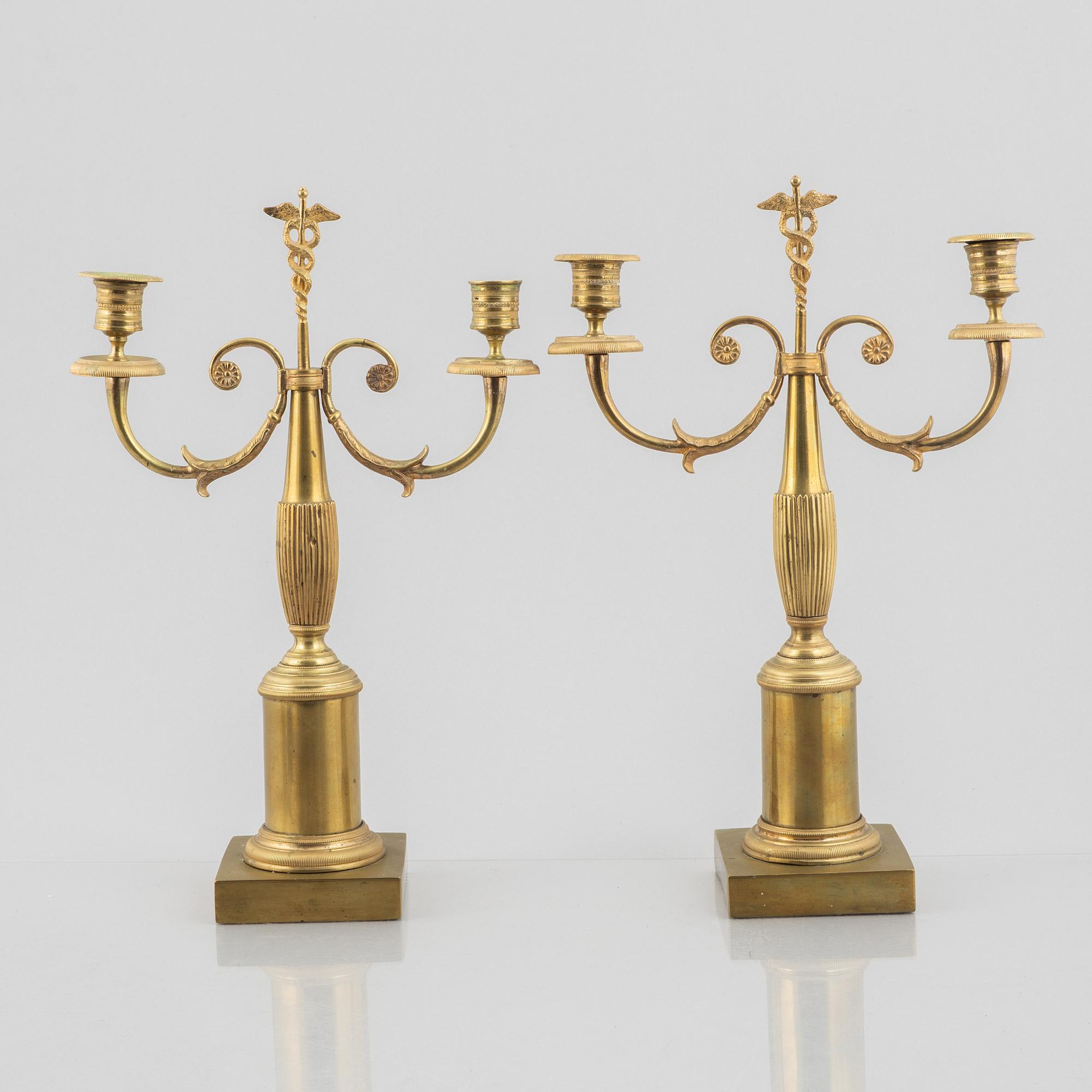 A pair of brass candelabra, first half/mid 19th century.