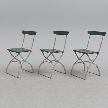 A garden table and four chairs, first half of the 20th century.