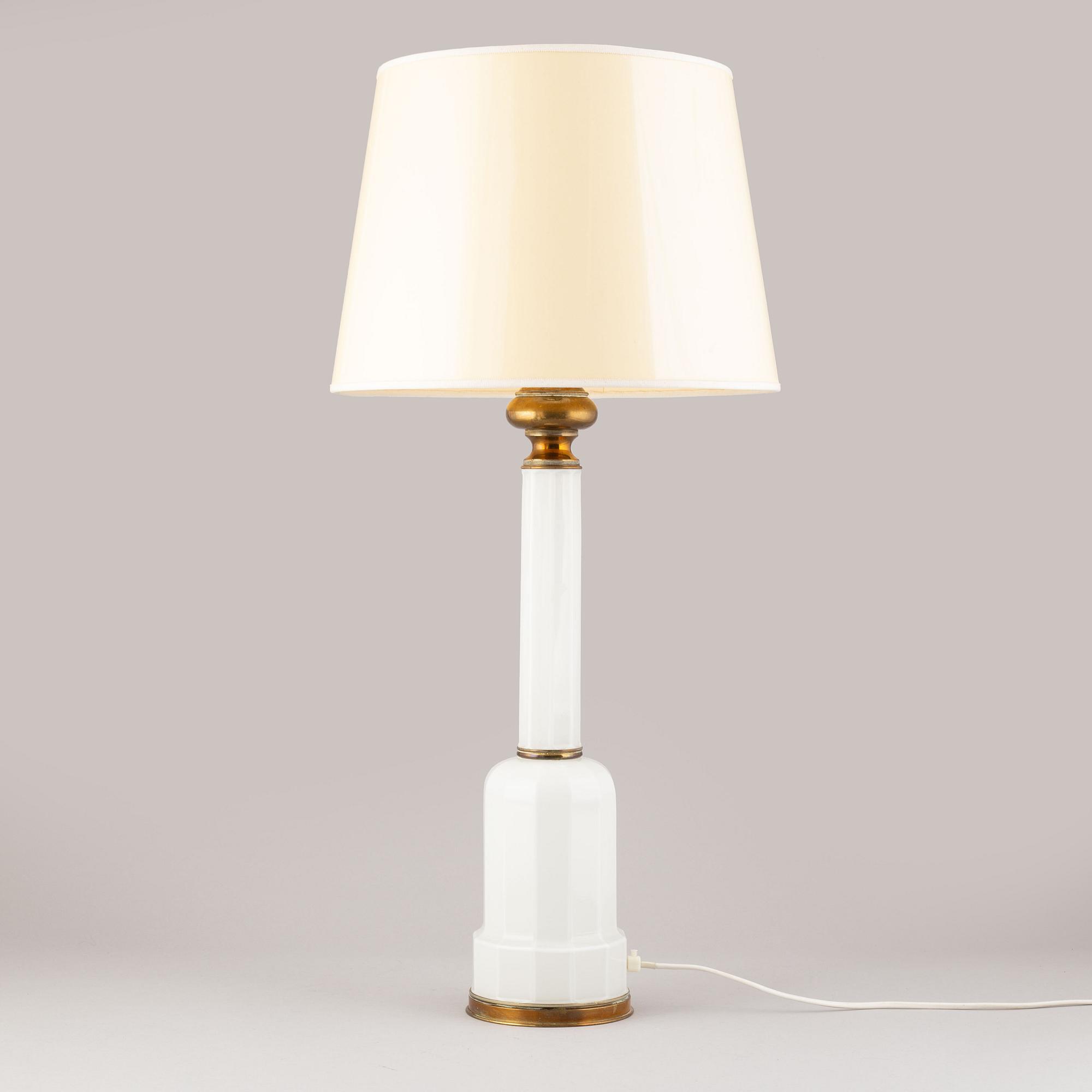 A glass and brass table lamp, mid/second half of the 20th century.