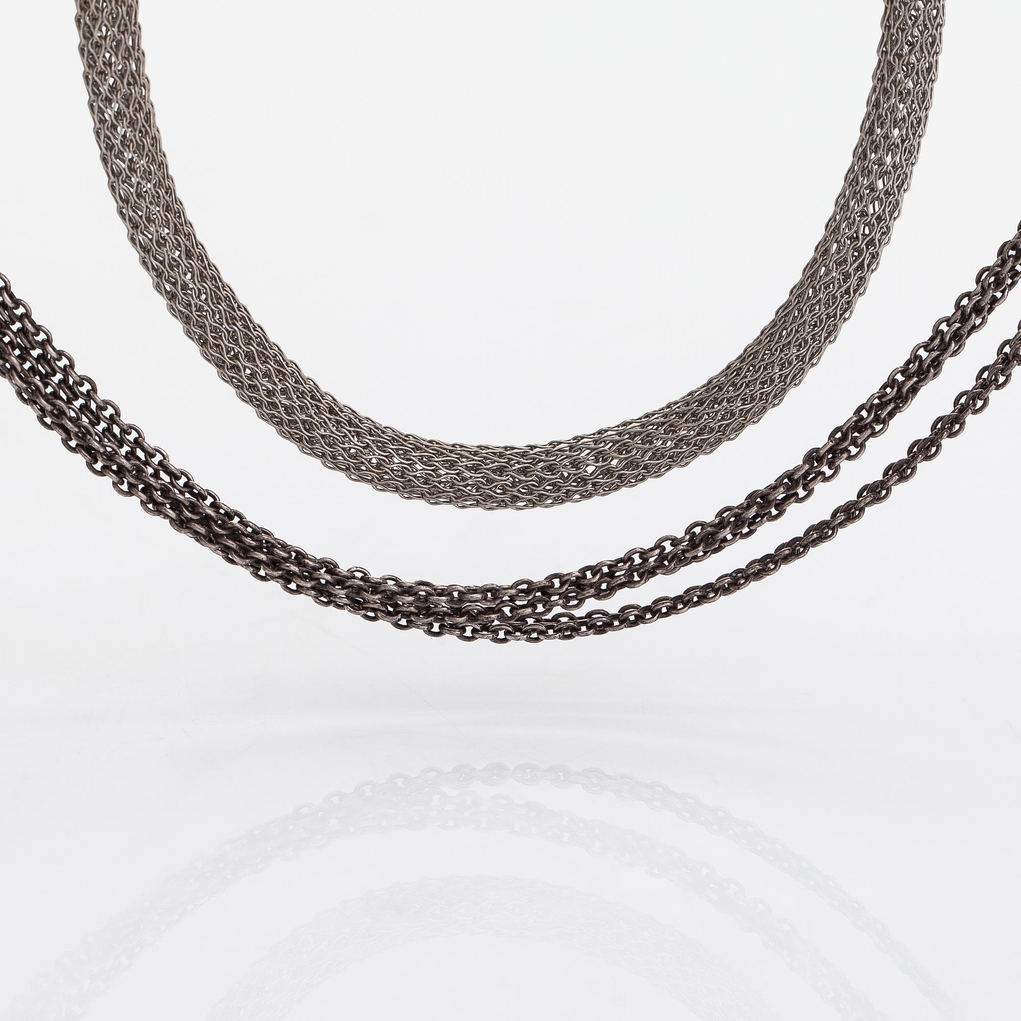 Ole Lynggaard A set of two sterling silver necklaces. Denmark.