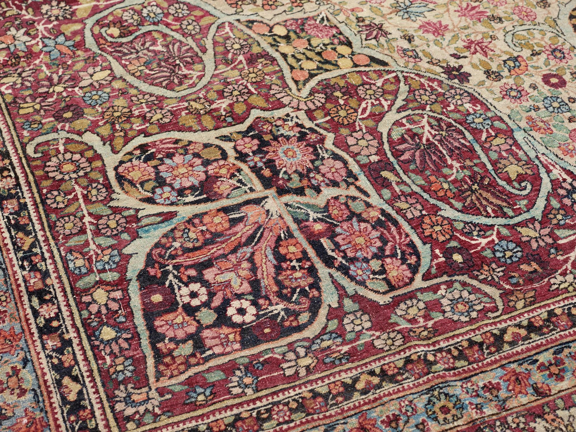 An antique Kerman Laver carpet, c. 586 x 385 cm.