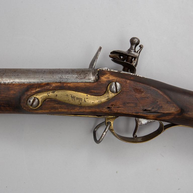 A flintlock shotgun, circa 1800.