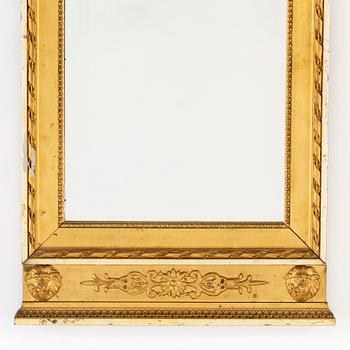 A late gustavian style mirror, ca 1900.