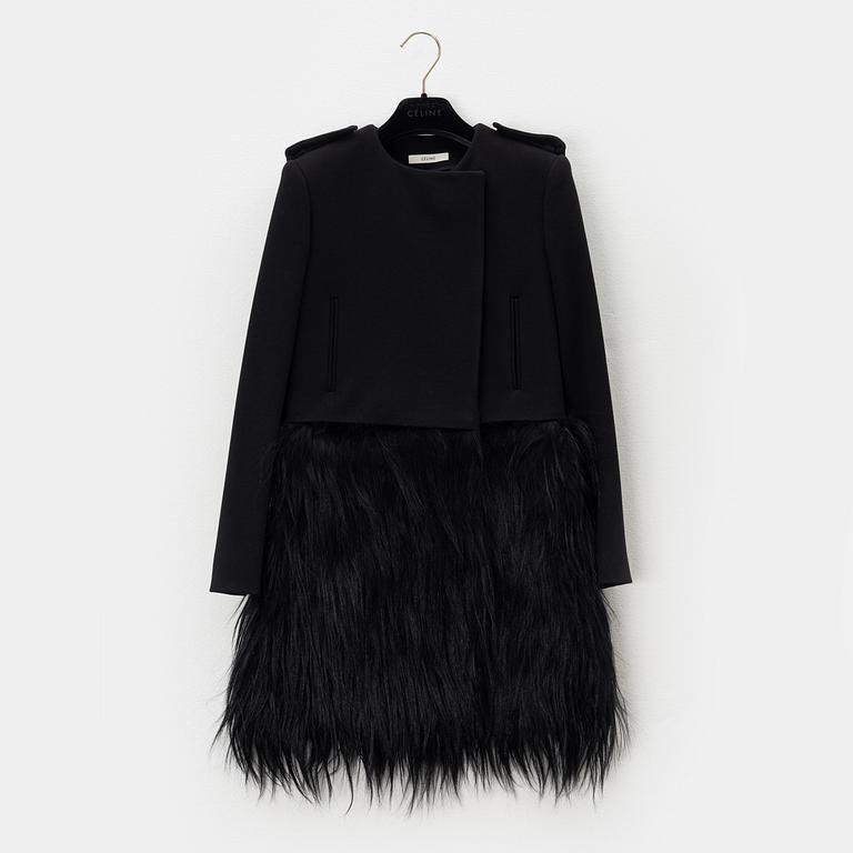 Céline, a black wool and fur coat, size 34.