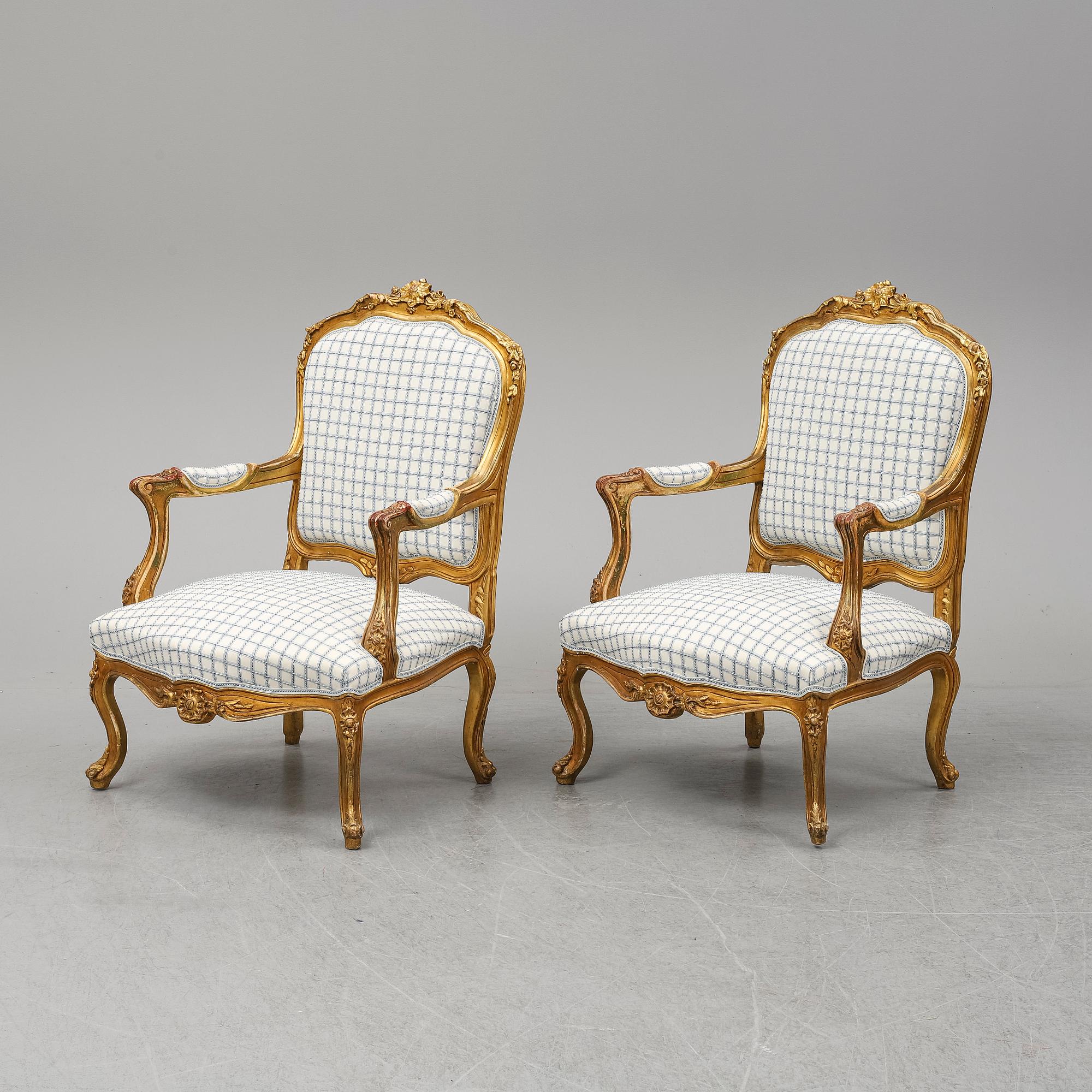 A pair of neo-rococo easy chairs, late 19th century.