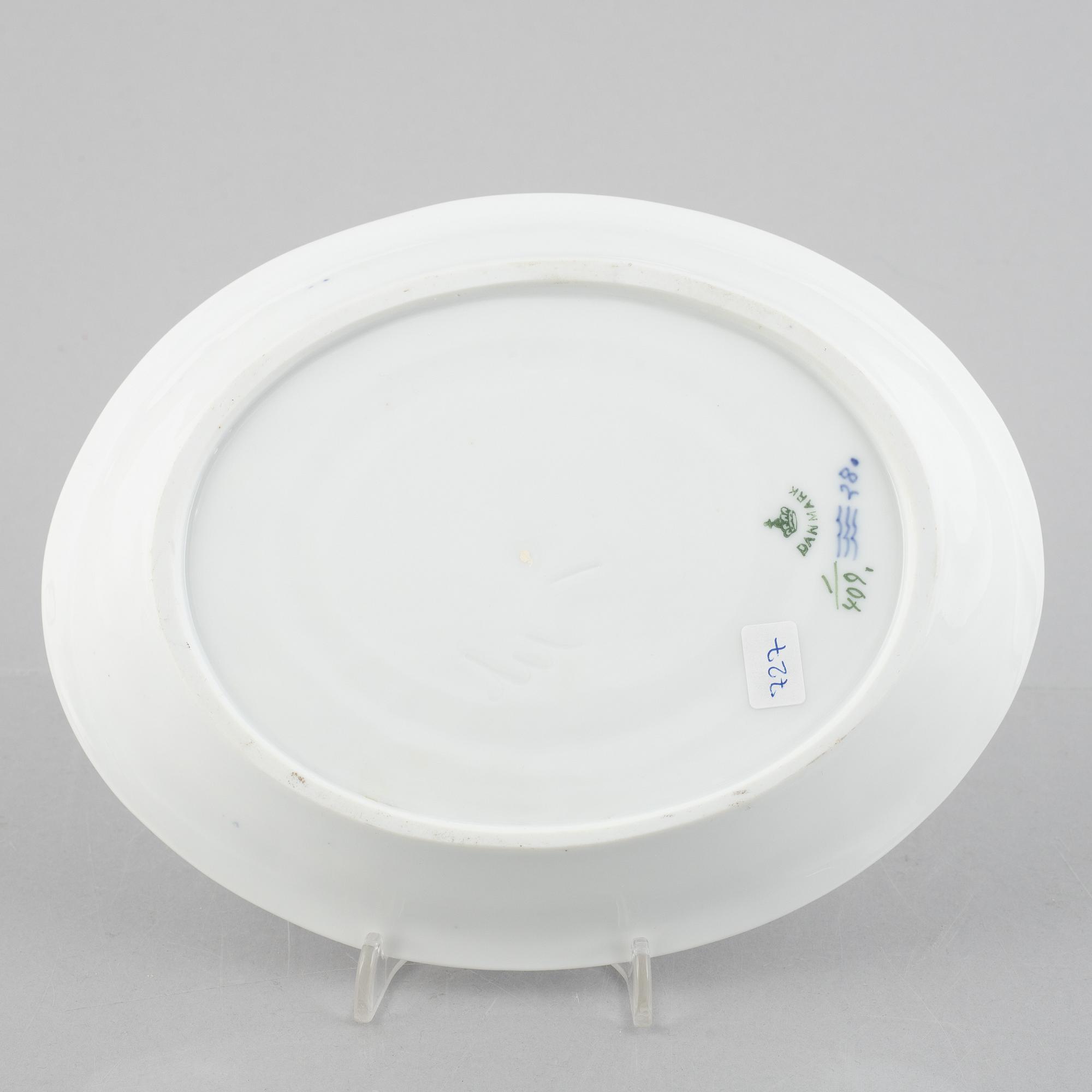 A 'Blue Fluted Plain' /'Musselmalet' sauce boat with stand, Royal Copenhagen, model 406 and 409, 1963 and 1893-1900.