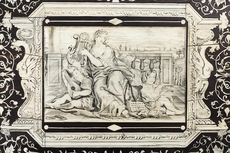 A Renaissance-style ebony, ebonized and ivory-inlaid library table, late 19th century, presumably Germany.