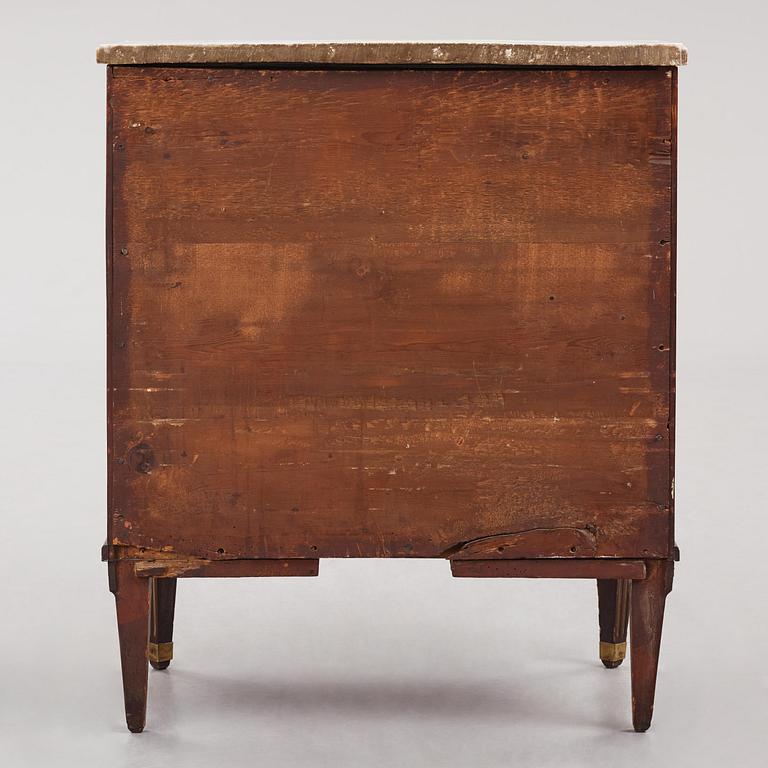 A late Gustavian mahogany, brass-mounted and marble-top commode by C. G. Foltiern (master in Stockholm 1804-29).