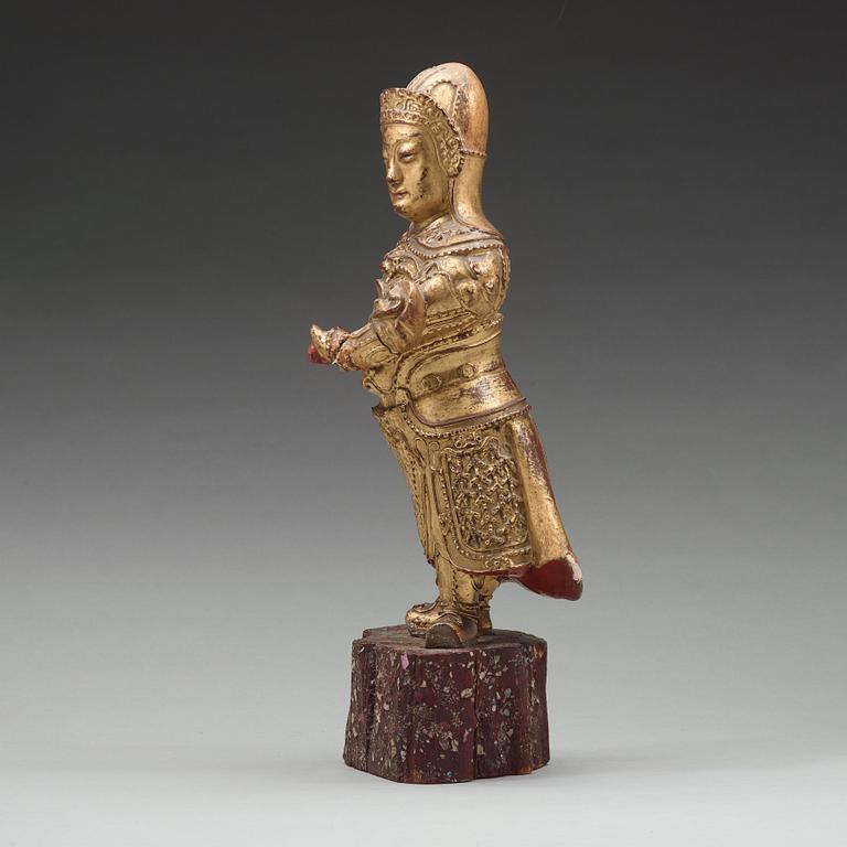 A wood sculpture of a guardian figure, (1644-1912).