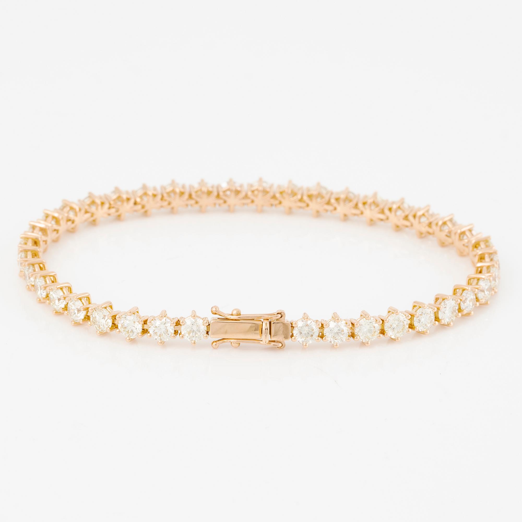 Tennis bracelet in 18K gold with brilliant-cut diamonds.