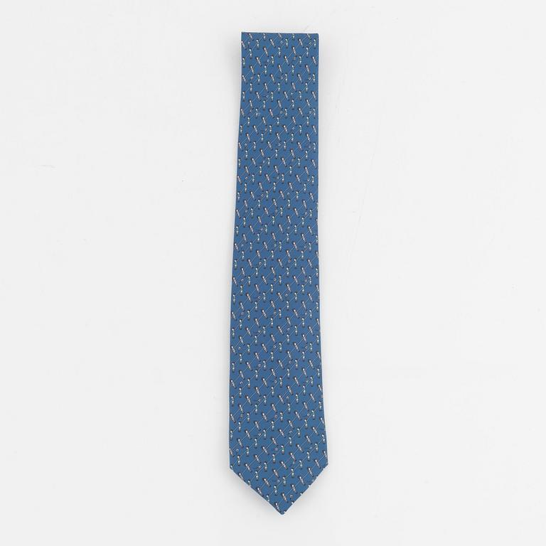 Hermès, a silk tie and two pocket squares.