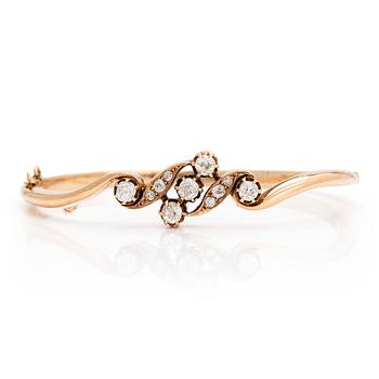 A 14K gold bangle, set with old-cut diamonds, St. Petersburg 1882-1898.