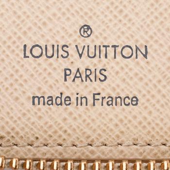 LOUIS VUITTON, a damier azur wallet.