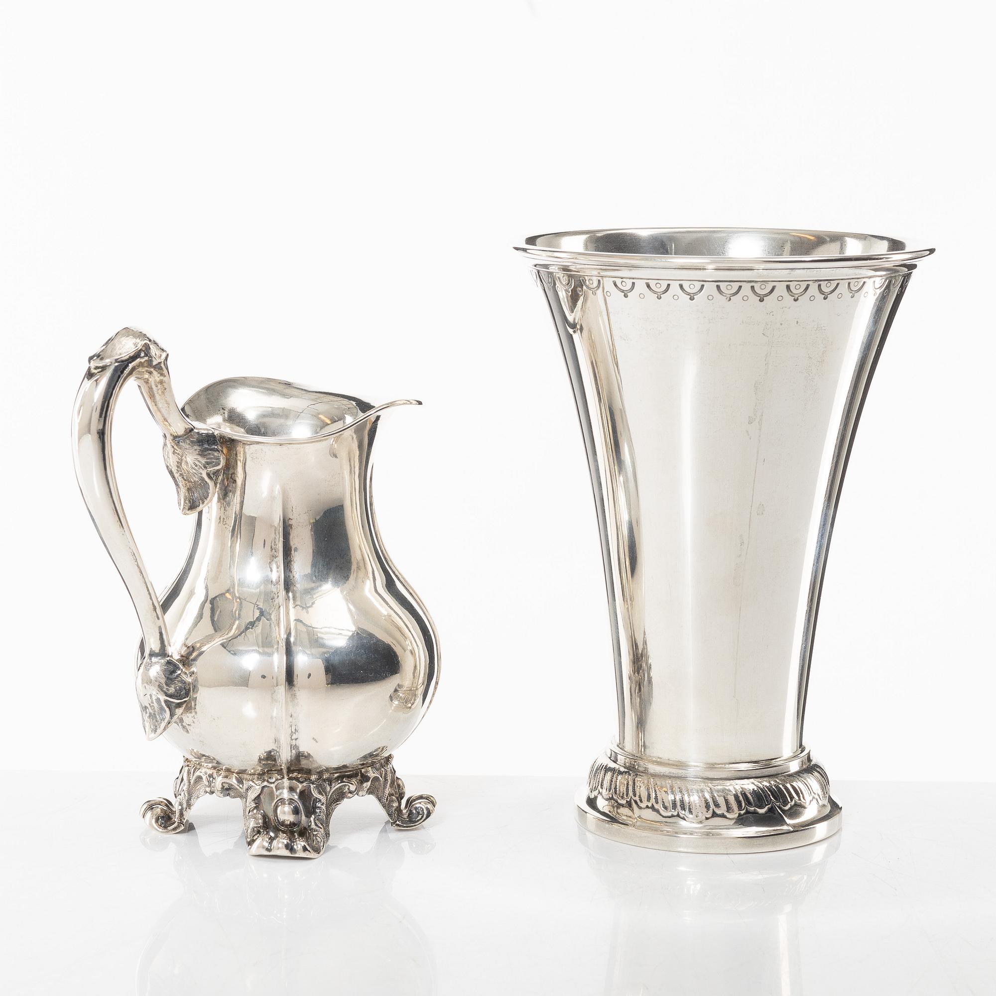 A Swedish silver beaker and a jug, including CG Hallberg, Stockholm 1927.
