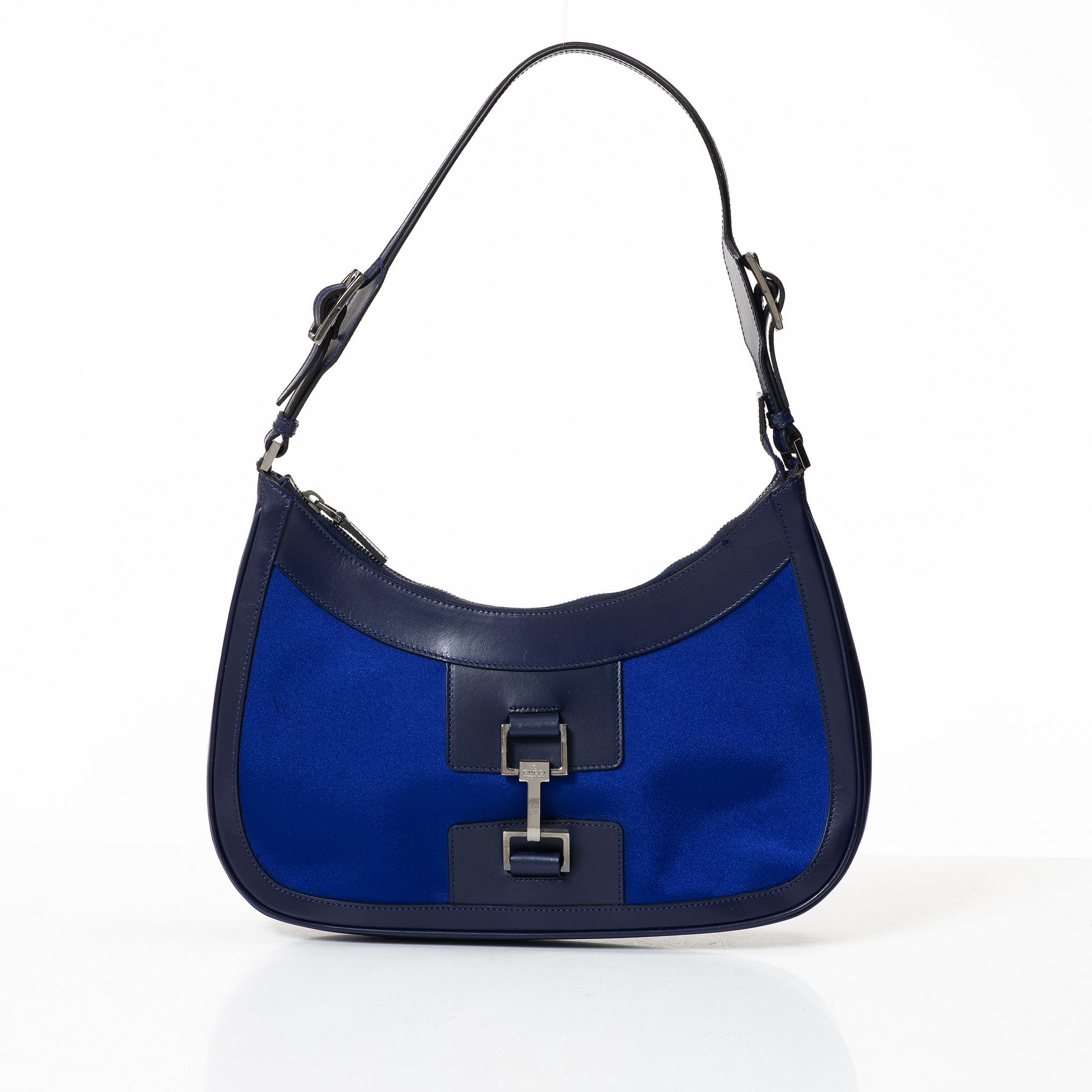 Gucci, a blue leather and fabric bag.