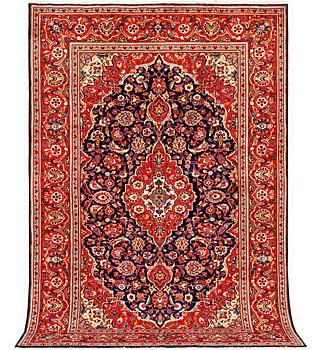 A Kashan carpet, c. 305 x 200 cm.
