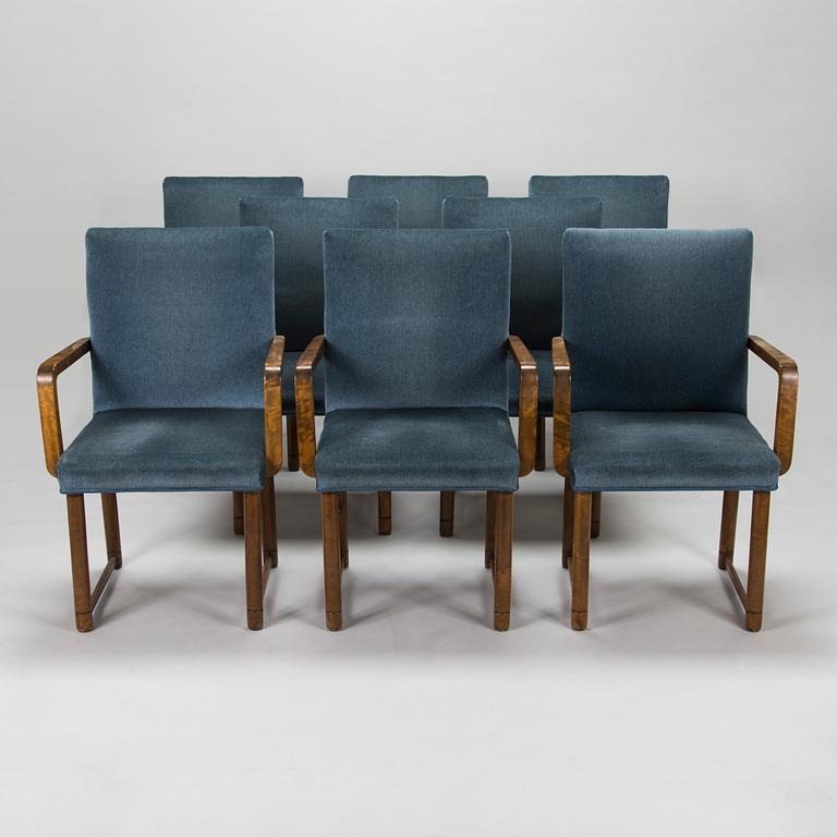 Eight 1930's open armchairs.