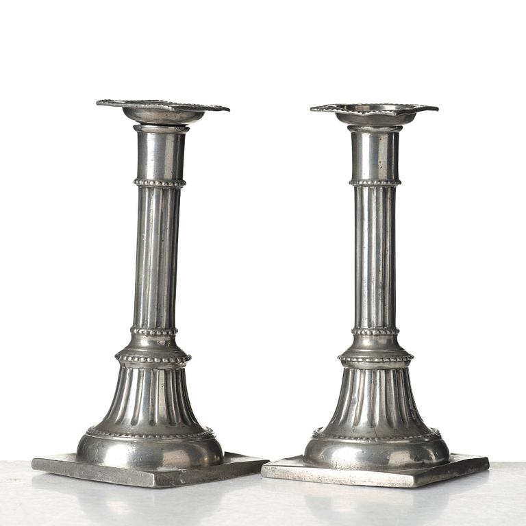 A pair of late Gustavian pewter candelsticks by Daniel Rising, Åbo 1797.