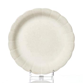 Wilhelm Kåge, 15 pieces of "Carrara" and "Gold Carrara" stoneware dishes, Gustavsberg, Sweden, 1930s/40s.