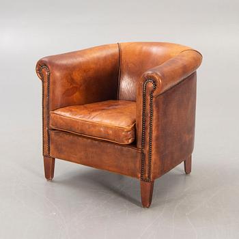 A leather easy chair later part of the 20th century.