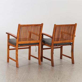 A pair of Danish Trip Trap armchairs.