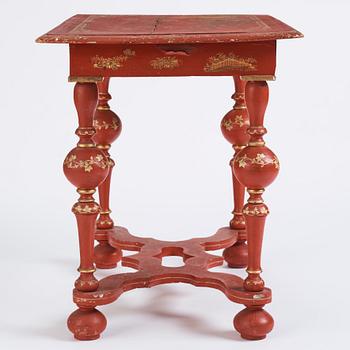 A late Baroque-style japanned table, 19th century.