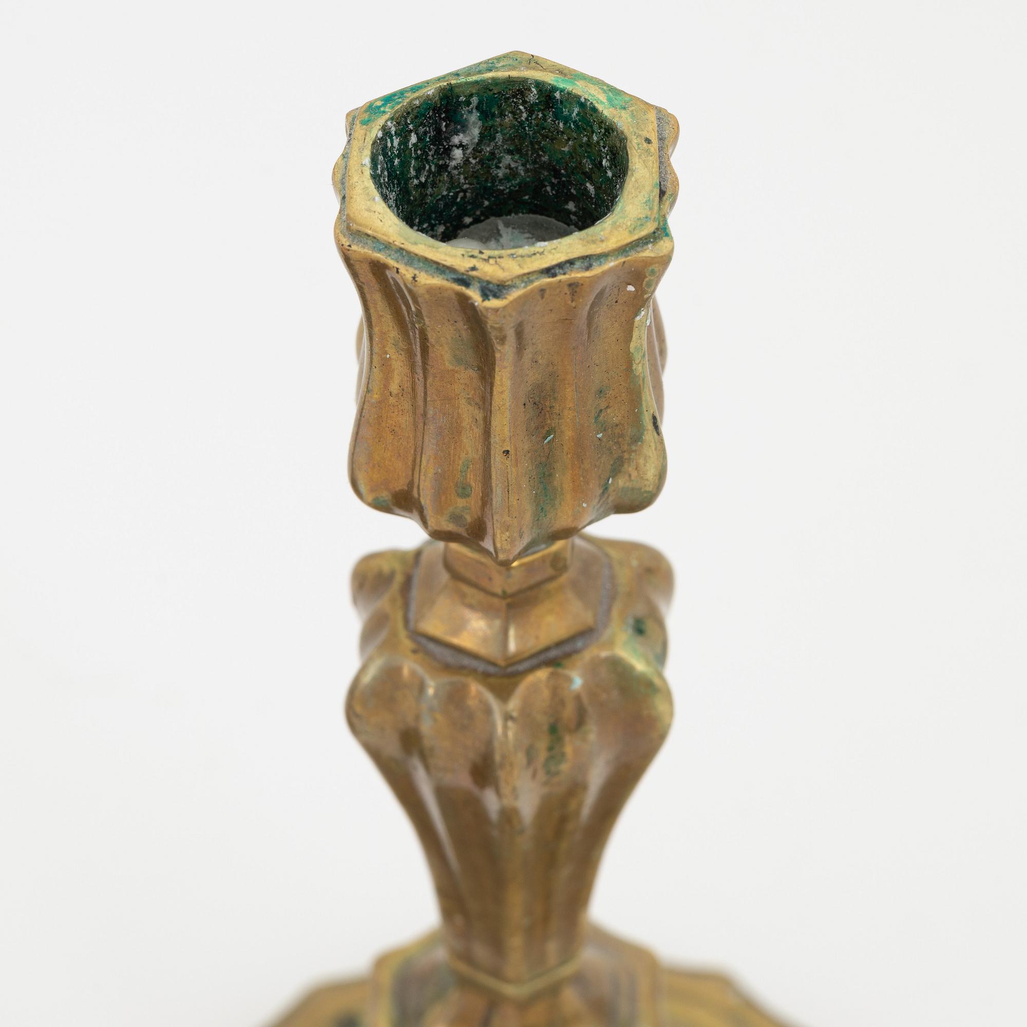 A pair of French brass candles sticks, 19th Century.