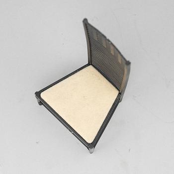 Miniatures of three famous design chairs, 21st century.