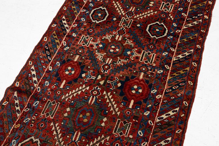 An antique Sauj Bulag runner, Eastern Kurdistan, c. 360 x 155.