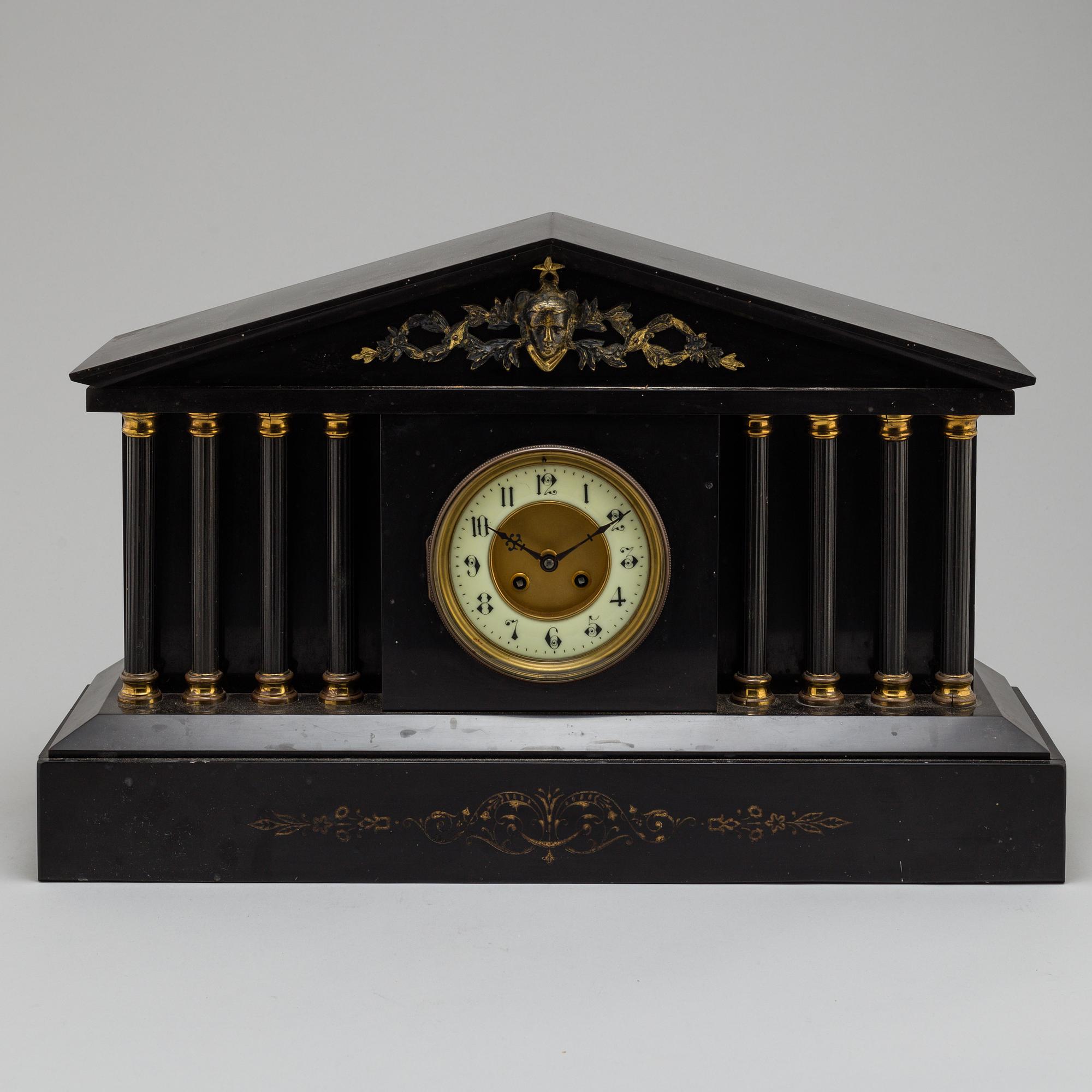 An end of the 19th century stone mantle clock.