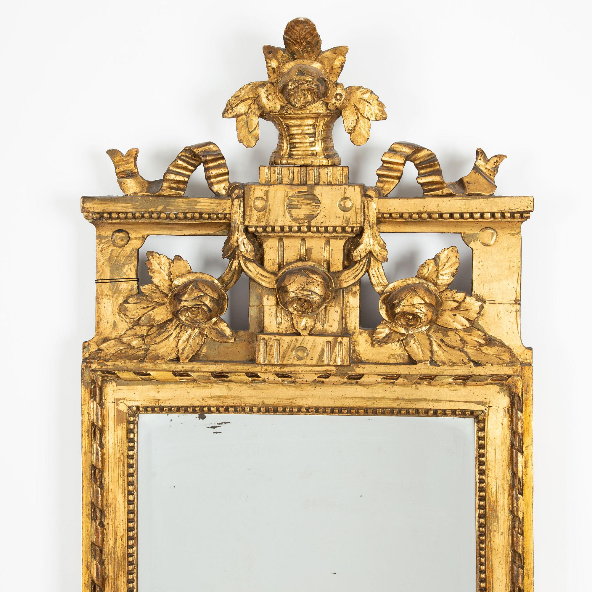 A Gustavian giltwood mirror, late 18th century.