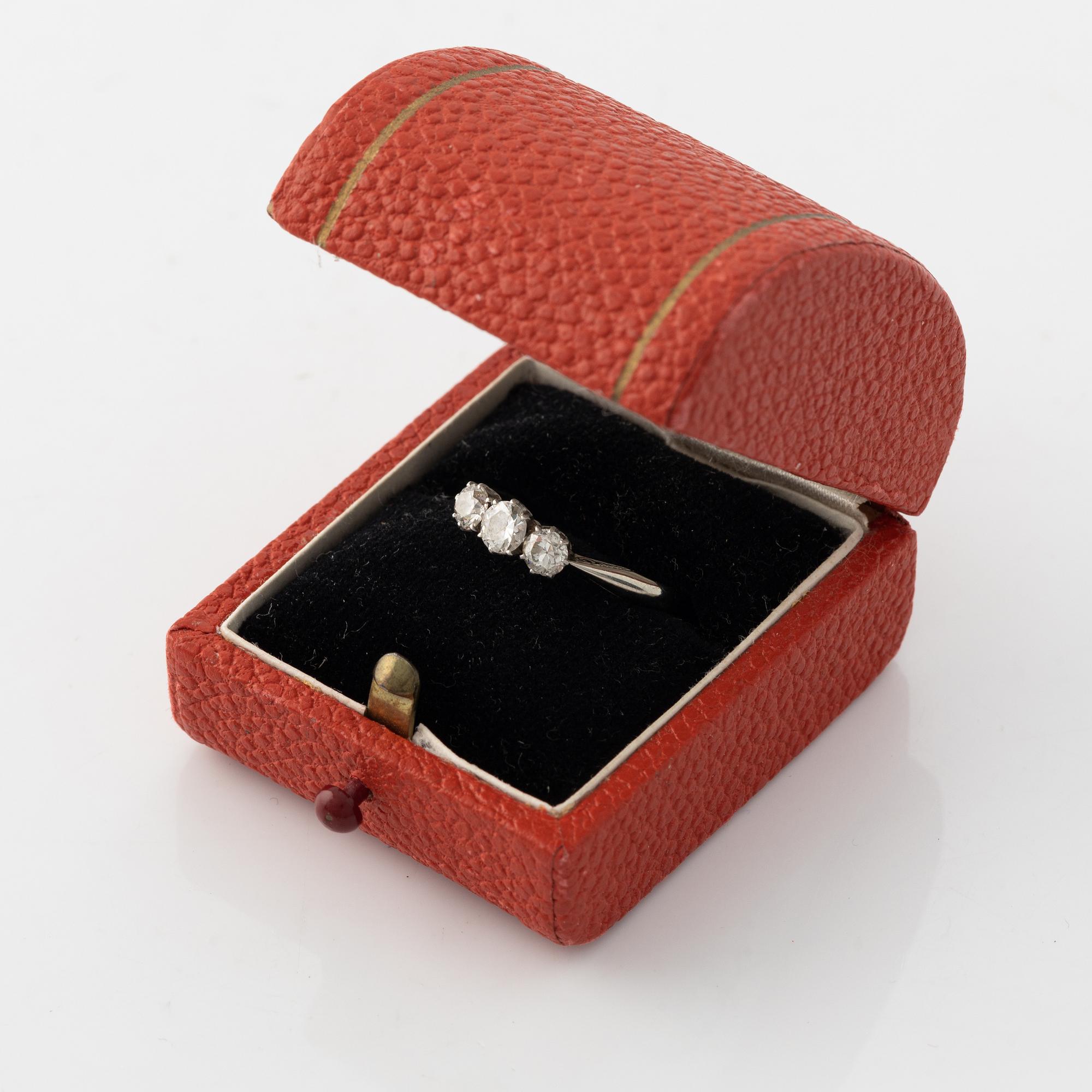 18K white gold and brilliant cut diamond three stone ring.